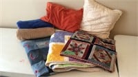 Handmade blankets, fleece throws, throw pillows.