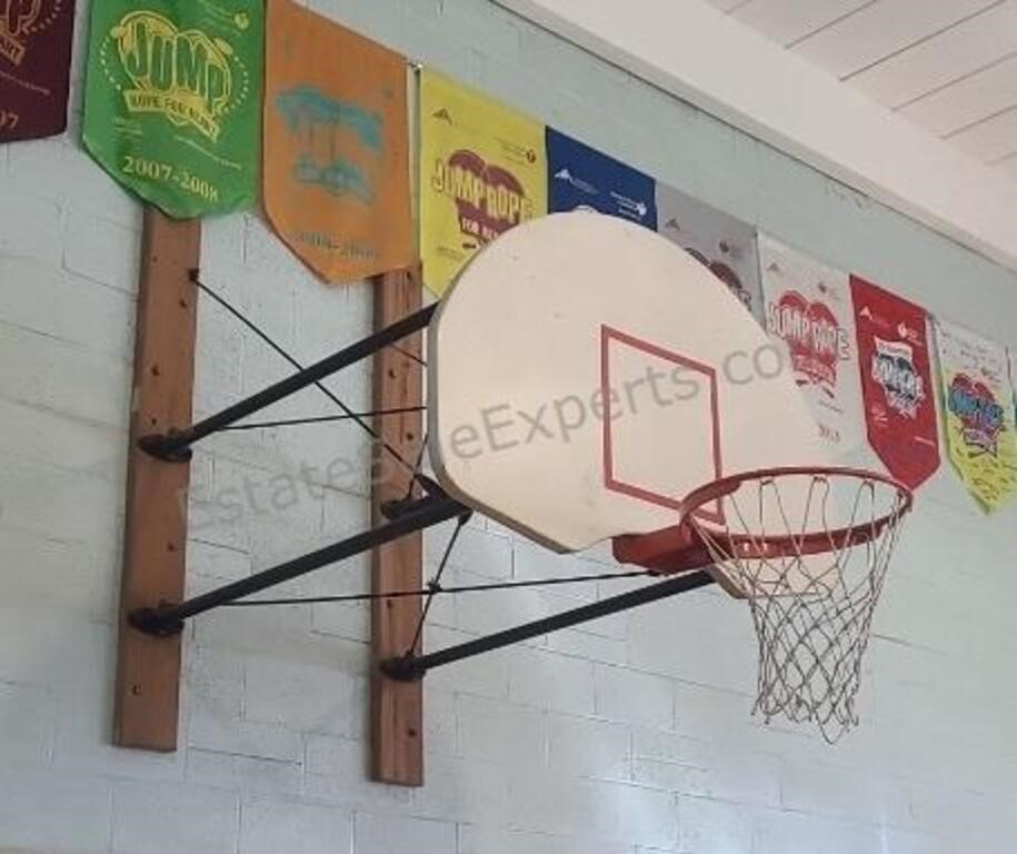 Backboard, rim and frame. Attached to wall. Buyer