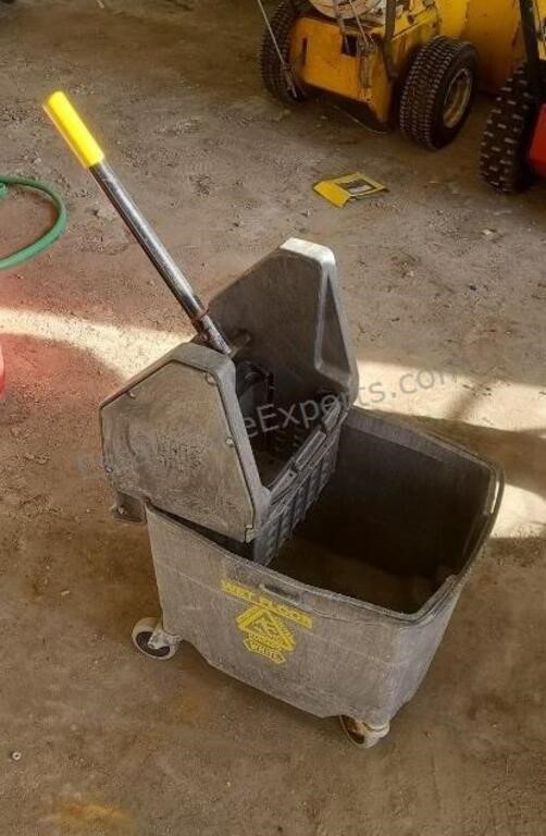 Mop ringer and bucket on casters.