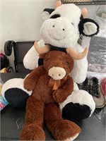 2 large stuffed cows clean