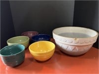 crock bowl with a big chip and five soup bowls
