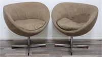 Pair of mid century modern swivel chairs