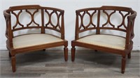 Pair of mid century barrel back arm chairs