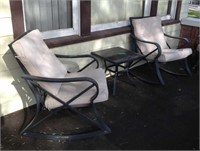 Iron patio rocking chairs, & table, (front porch)