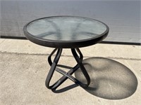 Glass top patio table