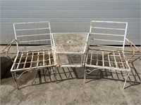 2 white metal chairs w/ table