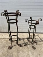 2 green metal plant stands