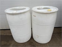 2 plastic rain barrels
