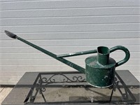 Green metal haws watering can