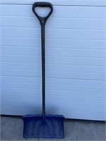 Blue snow shovel
