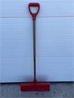 Red snow shovel