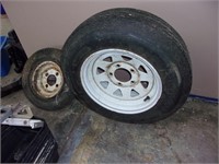 large trailer tire 13" and small one