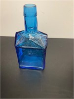 Antique blue glass bottle