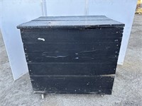 Black wood box on casters
