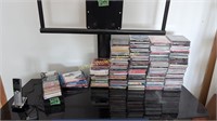 Tv Stand, Cds, Cassette Tapes, Dvds.
