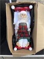Animated sleeping Santa figure