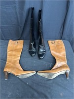 Two pairs of women’s leather boots labeled Coach &