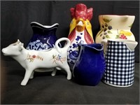 Group of ceramic, glass pitchers