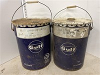 2 empty metal Gulf pails
