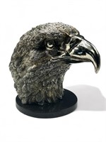 Large metal bald eagle statue on marble base 
9
