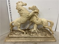 Heavy horse fighting statue