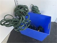 Blue container w/ green extension cords