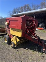 New Holland 848 round baler