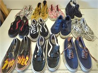 11 pairs of Vans shoes