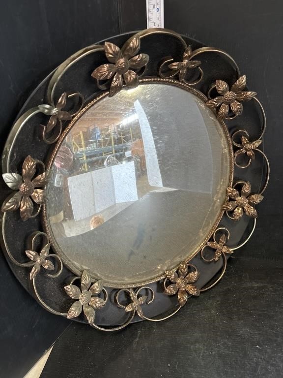 Metal framed round bowed mirror