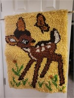 Bambi wall rug on a rod.