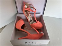 Pair of dress shoes: coral