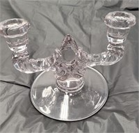 Glass candle holder with purple hue