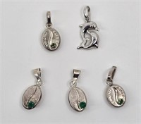 Five Small Sterlig silver pendant