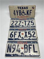 Four Texas License Plates