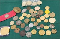 Tokens, bridle rosettes, pendants, etc