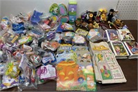 Box of McDonald’s toys and bags, snoopy tins and