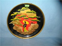 Oriental themed hand painted wall plate