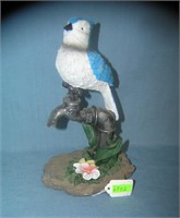 Modern bird and faucet figurine