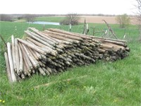 Large Pile Of Used Round Rail Fencing