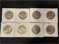 8 assorted date Kennedy half dollars