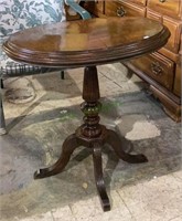 Antique oval four-legged parlor table 27 inches