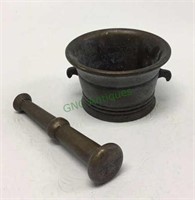 Antique pestle and mortar and heavy brass