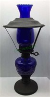 Cobalt blue oil lantern stands 17 inches tall