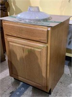 Oak cabinet with half drawer on top and door on