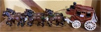 Cast iron horse drawn carriage measuring 6
