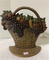 Cast iron doorstop fruit in basket measuring 8