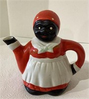 Vintage ceramic mammy teapot measuring 6 inches