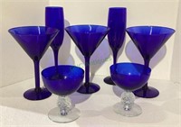 Cobalt blue glasses include three martini,