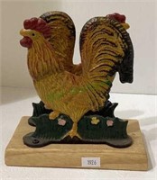 Napkin holder - rooster motif cast iron on wooden