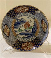 Beautiful Oriental themed porcelain bowl with a